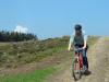 Chris on the last descent, the cafe's in sight.