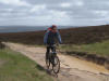 Battling against the wind on Percy Cross Rigg